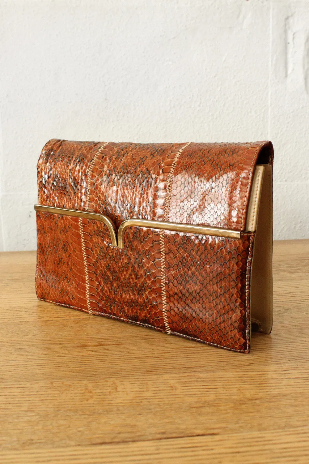 Amber Snakeskin Clutch