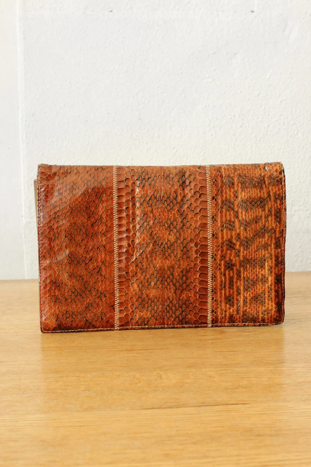 Amber Snakeskin Clutch